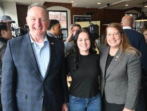 Rep. John Piscopo and Rep. Karen Reddington-Hughes pose with Arethusa's Brea Brousseau